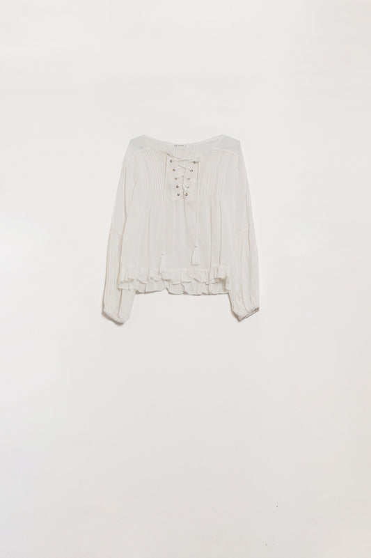 Q2 Chemise blanche avec extrémités à glands et fermeture par liens croisés