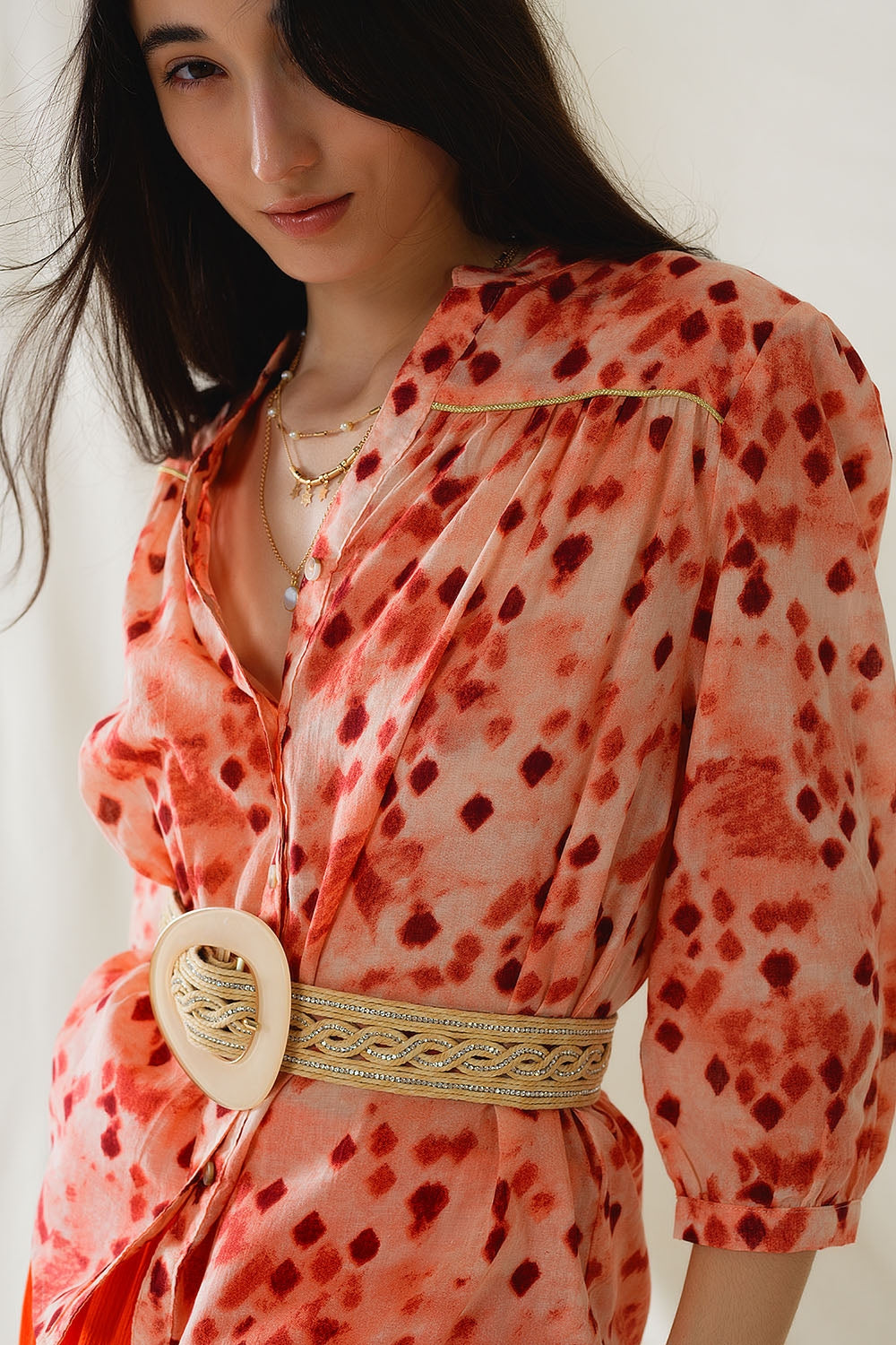 Chemise orange à imprimé abstrait et manches 3/4
