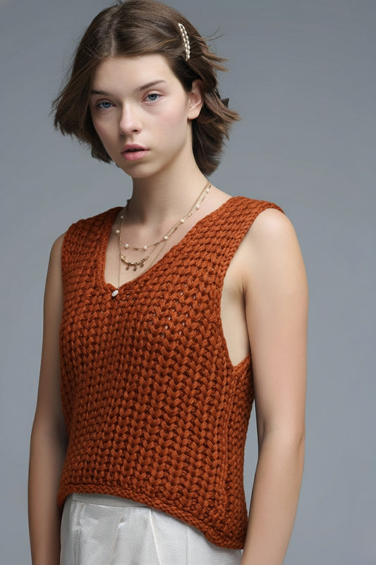 Q2 Gilet crochetŽ orange avec fils pailletŽs
