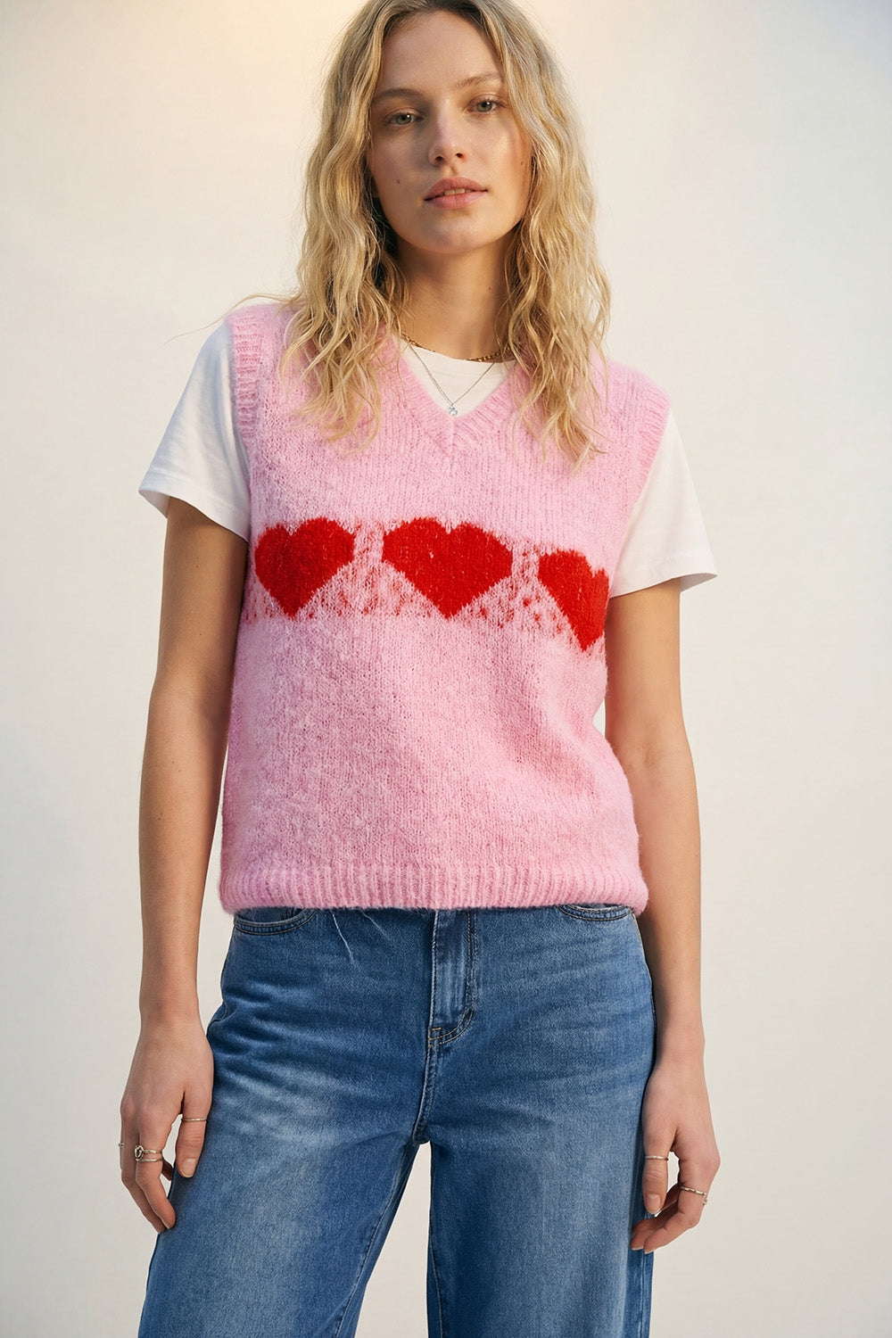 Gilet décontracté en tricot rose duveteux avec motif en forme de cœur