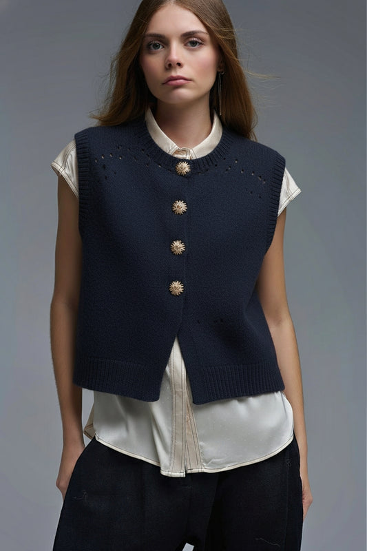 Q2 Gilet tricotŽ de couleur marine avec boutons dorŽs