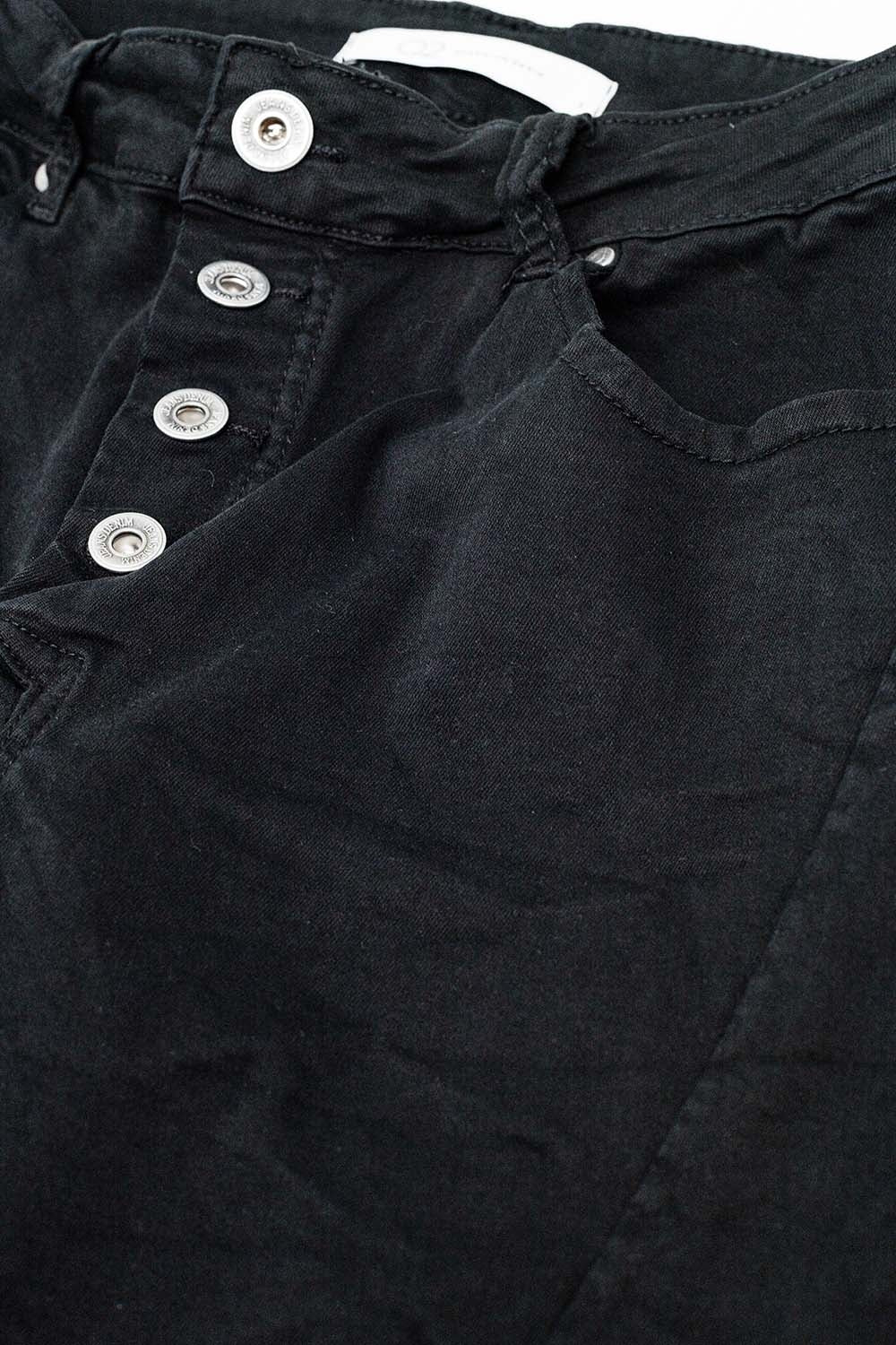 Jean skinny à boutons apparents noir
