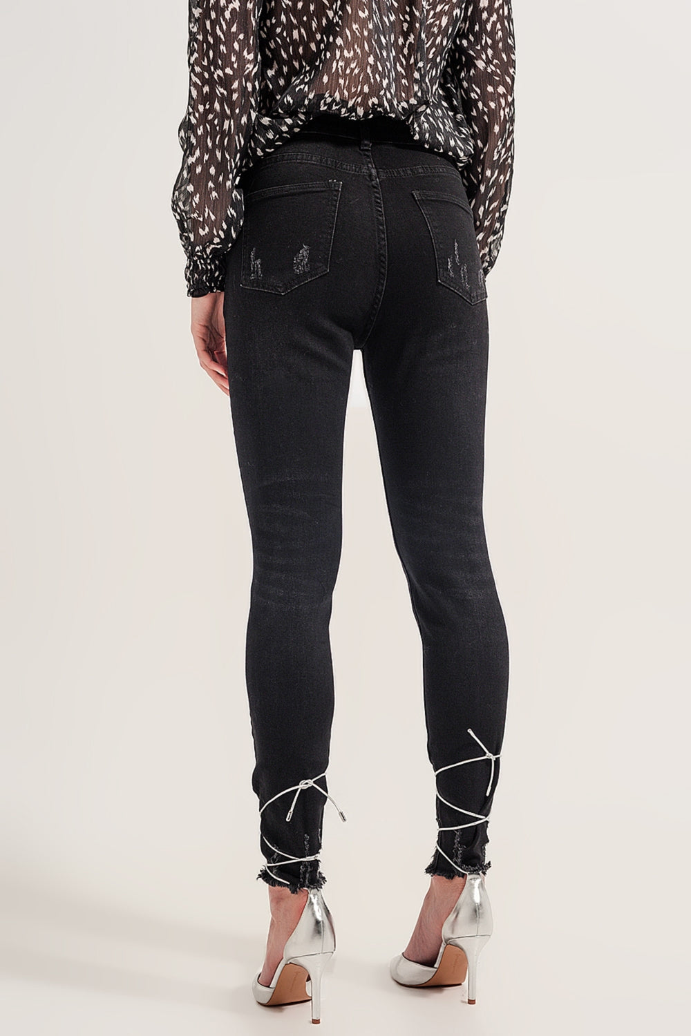 Jean skinny à ourlets bruts Noir