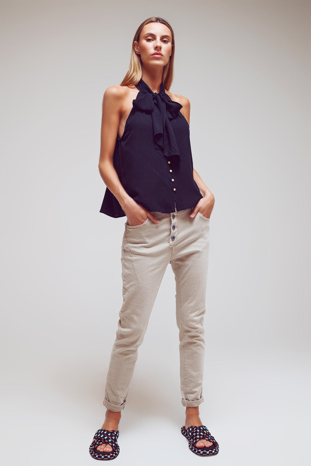 Jean skinny avec boutons apparents en beige