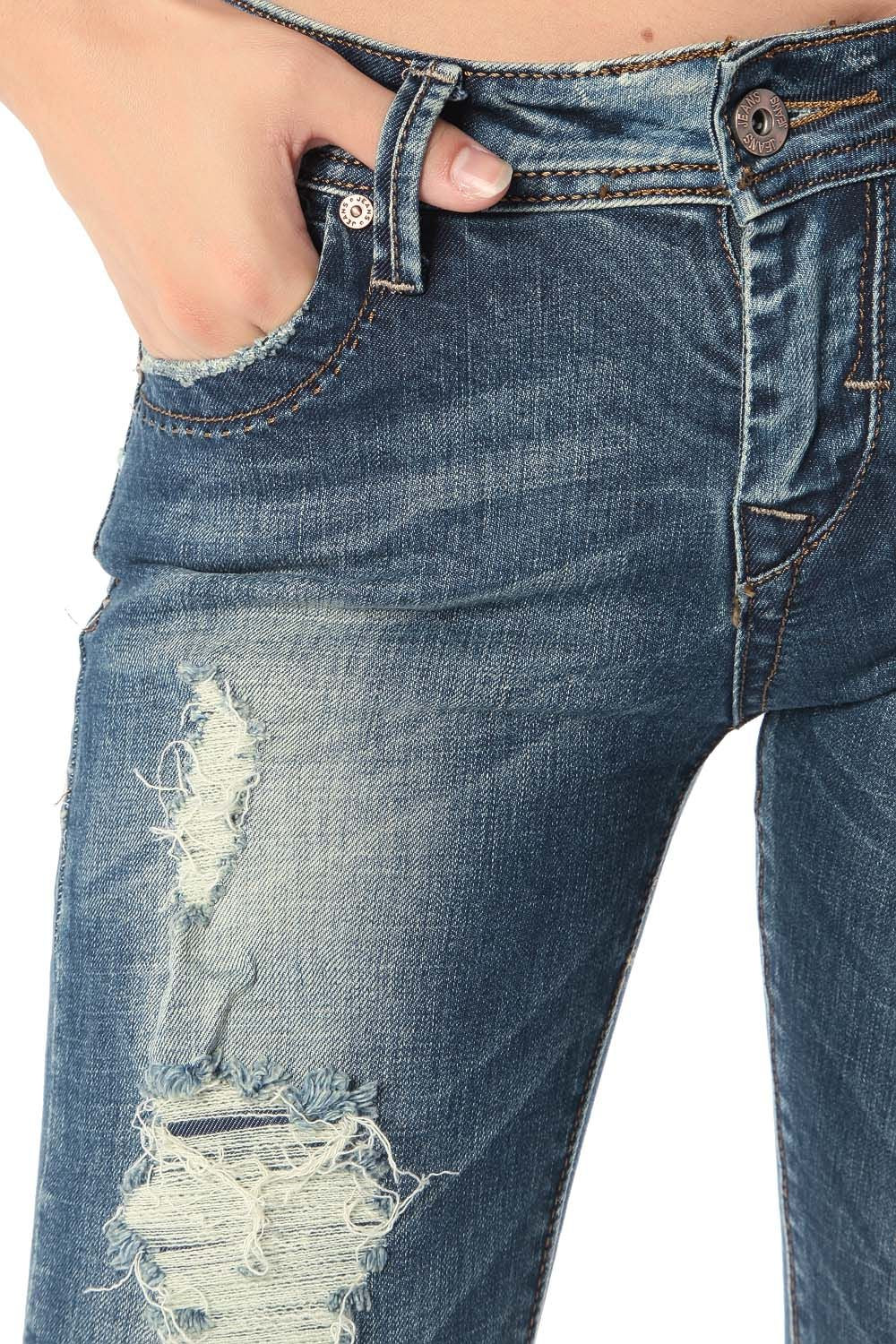 Jean skinny avec déchirures et effet usé