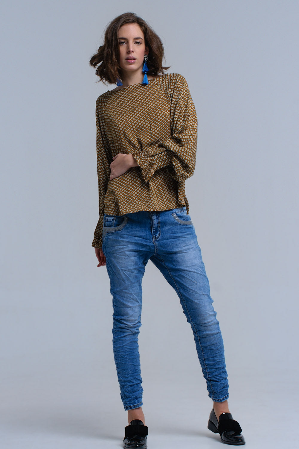 Q2 Jean skinny bleu avec des détails de paillettes