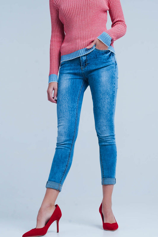 Q2 Jean skinny délavé avec motif léopard
