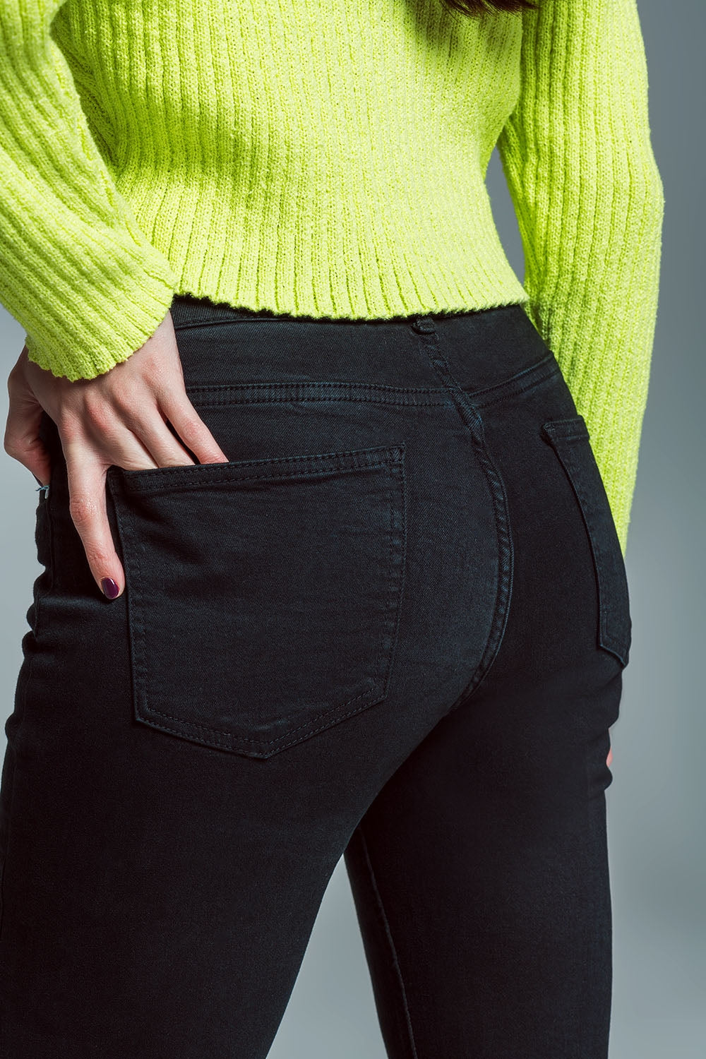 Jean skinny évasé avec double boutonnage en noir
