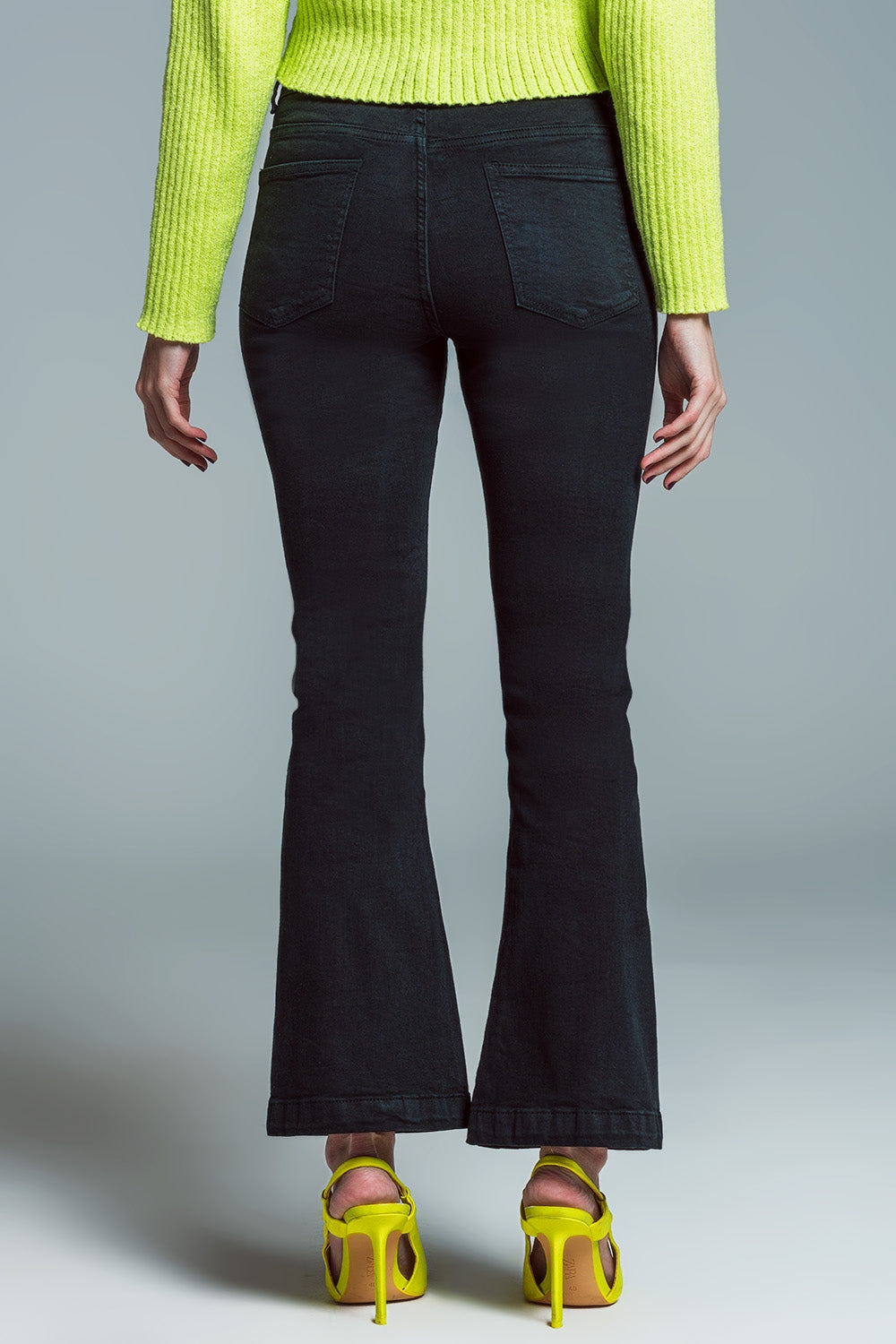 Jean skinny évasé avec double boutonnage en noir