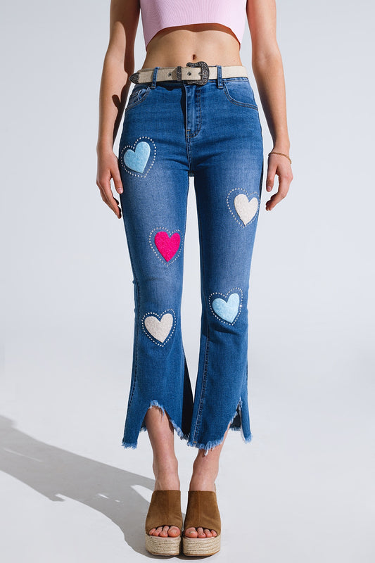 Q2 Jean skinny foncé avec cœurs entourés de clous