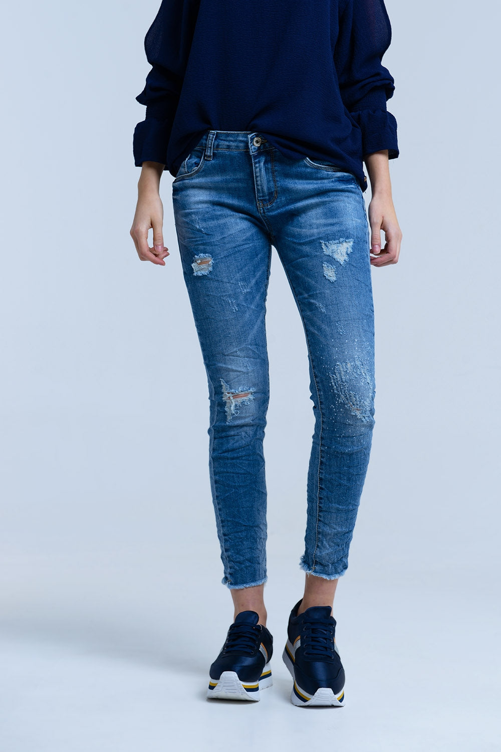 Jeans avec détails déchirés