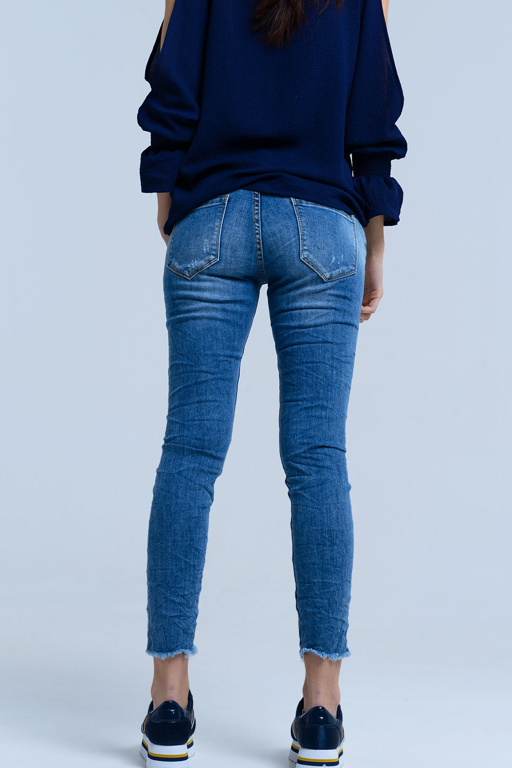 Jeans avec détails déchirés