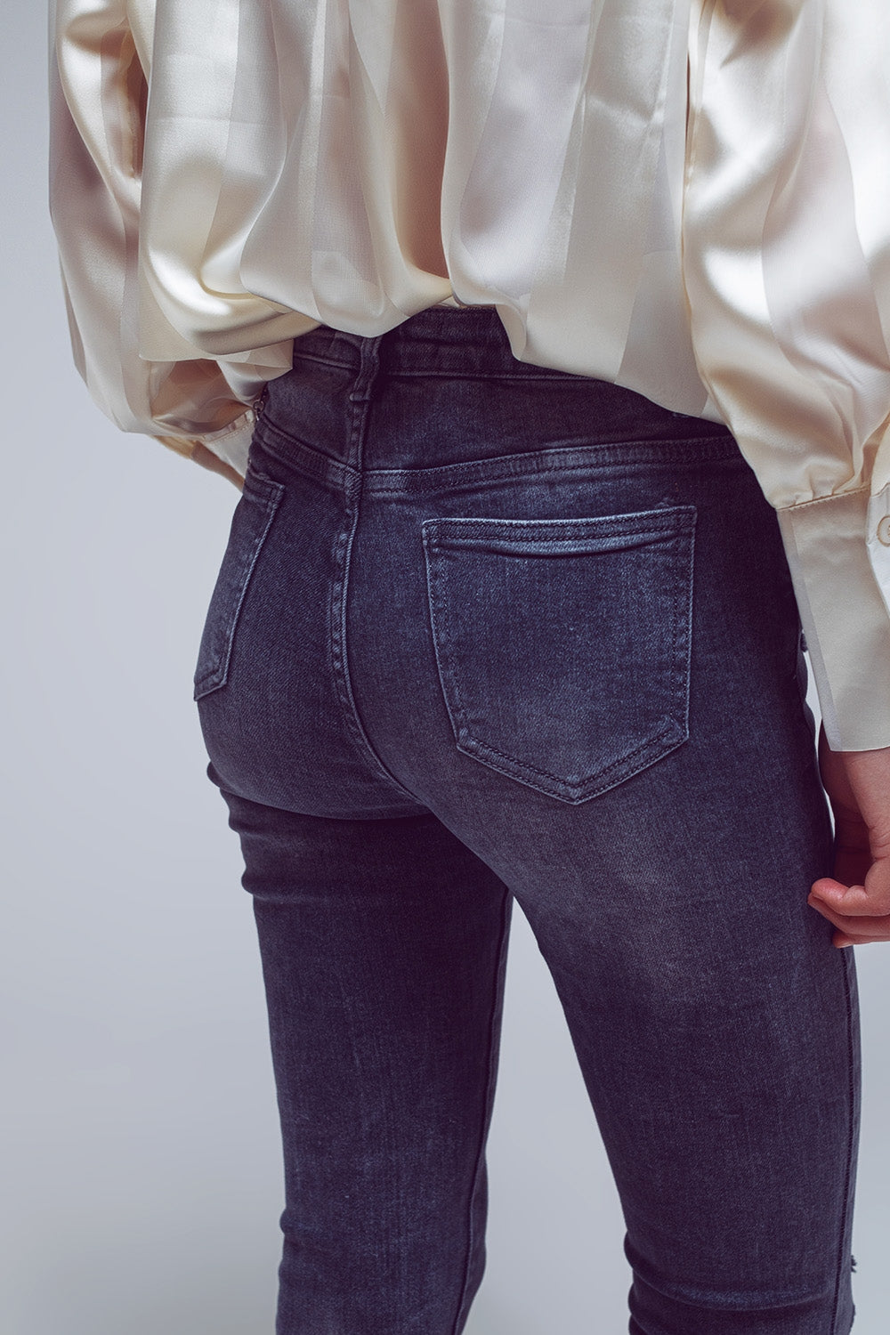 Jeans skinny déchirés en gris