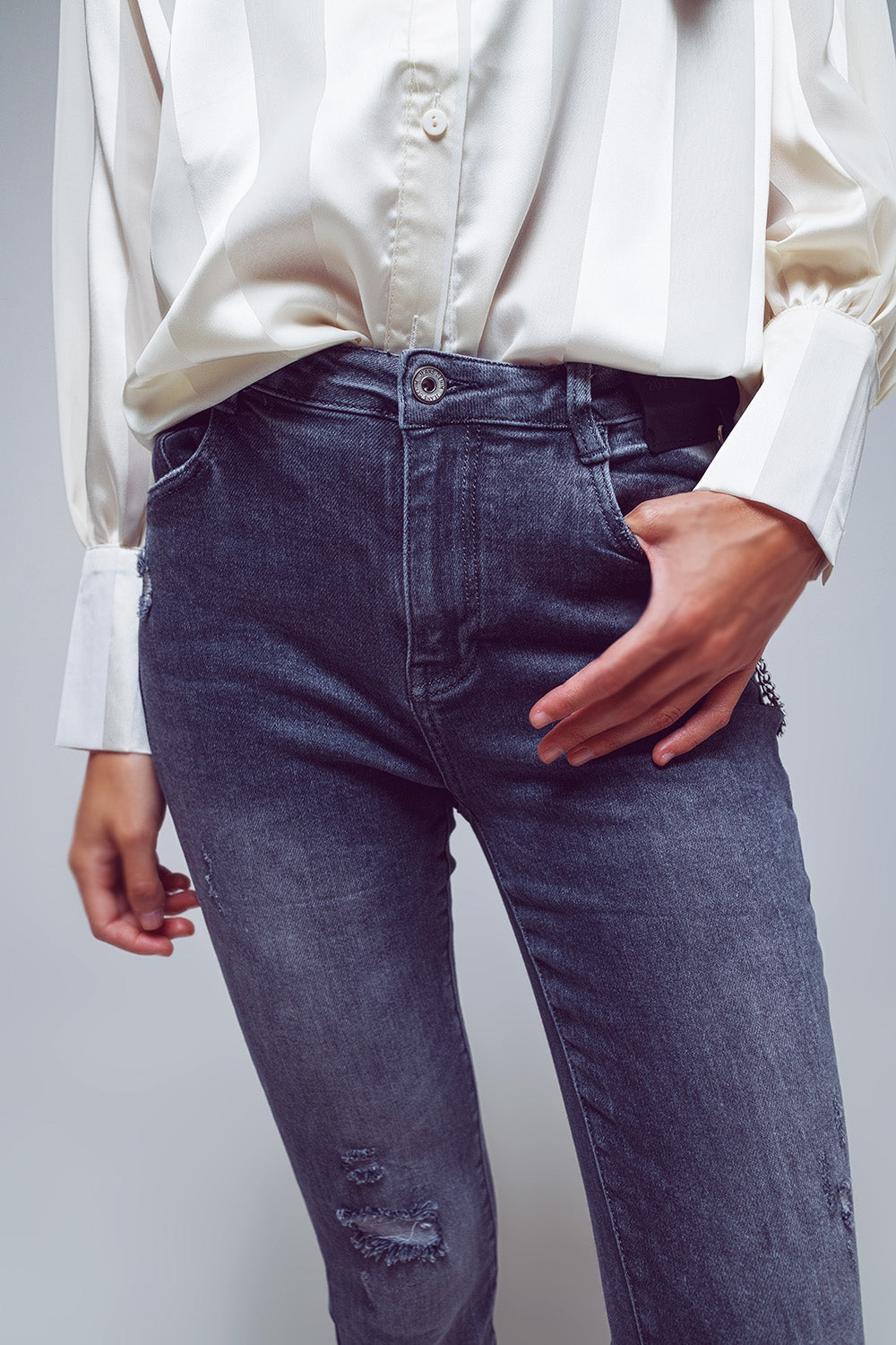 Jeans skinny déchirés en gris