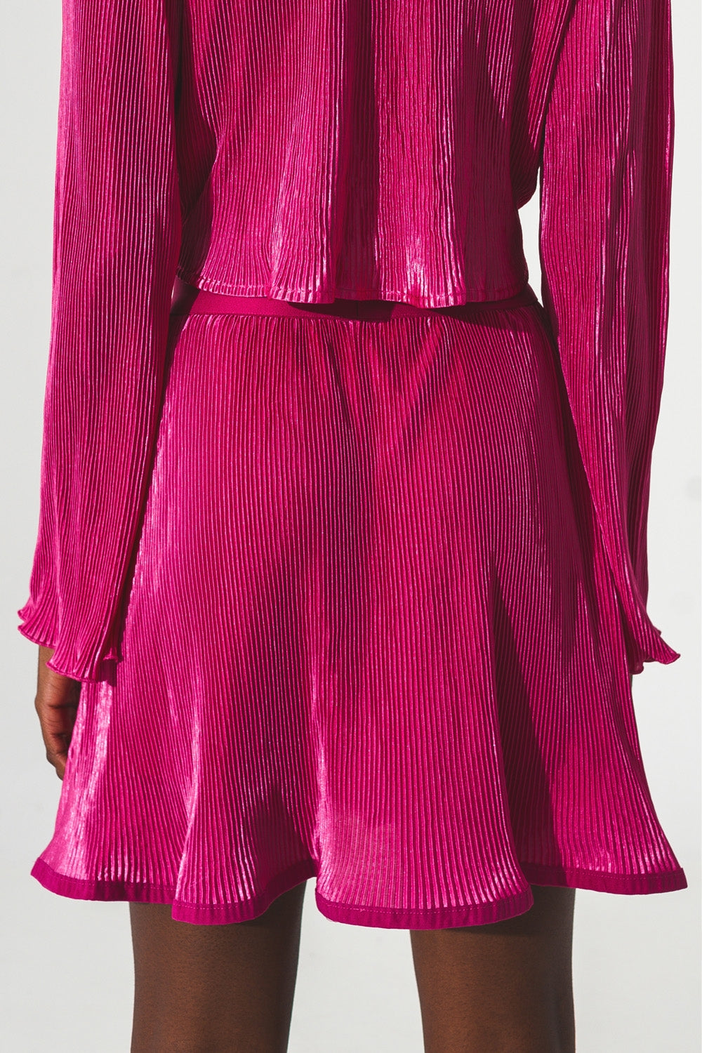 Jupe courte plissée en Fuchsia