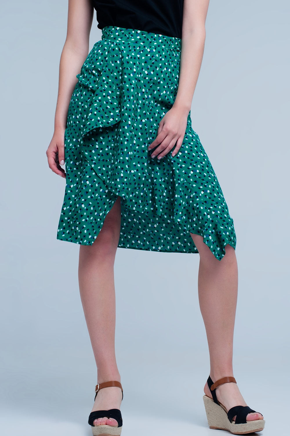 Q2 Jupe vert mi-longue avec volants et motif à pois