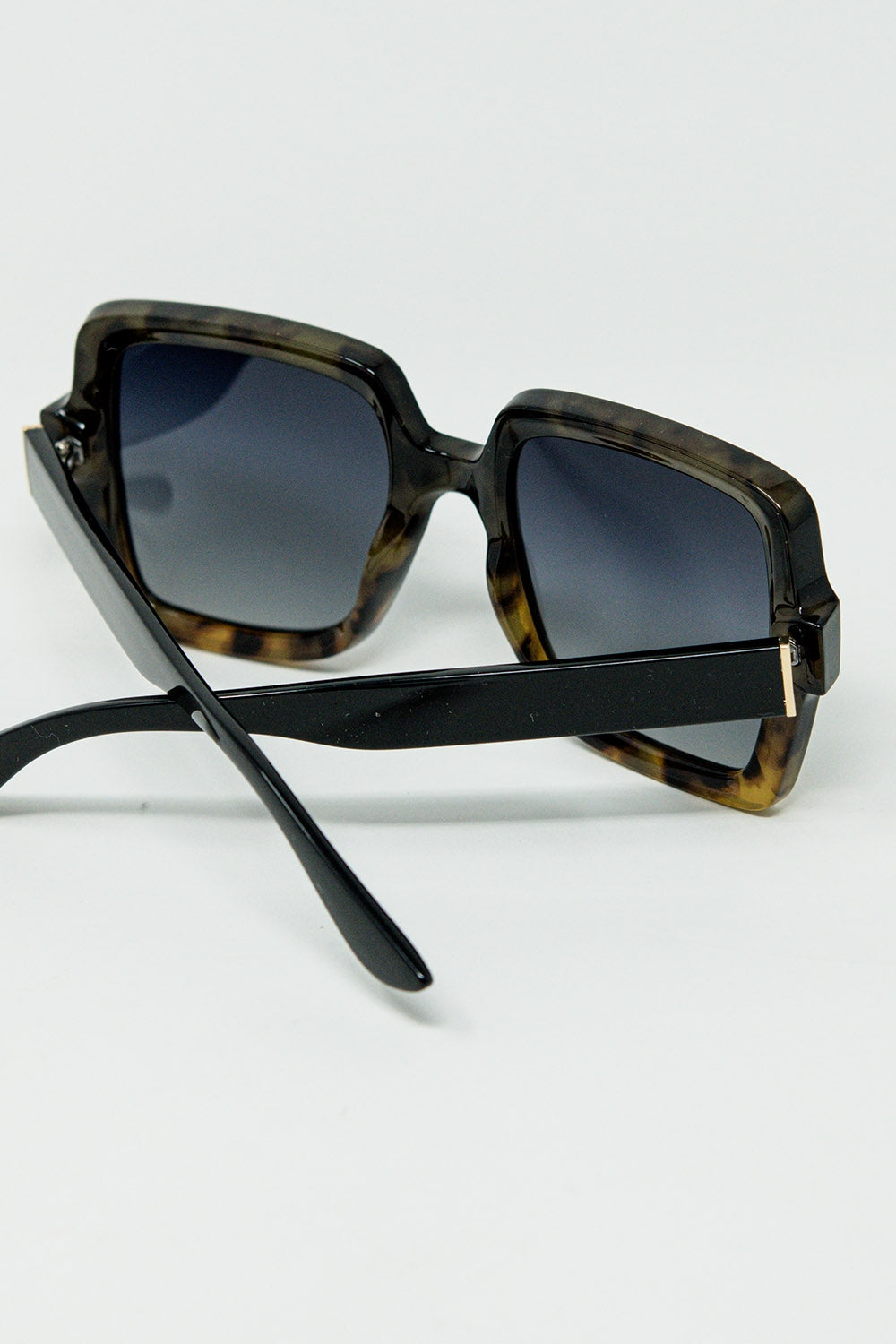 Lunettes de soleil avec monture à imprimé dégradé et branches noires