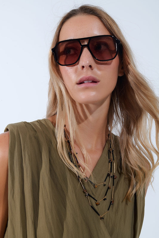 Q2 Lunettes de soleil de style rétro avec monture noire et verres orange