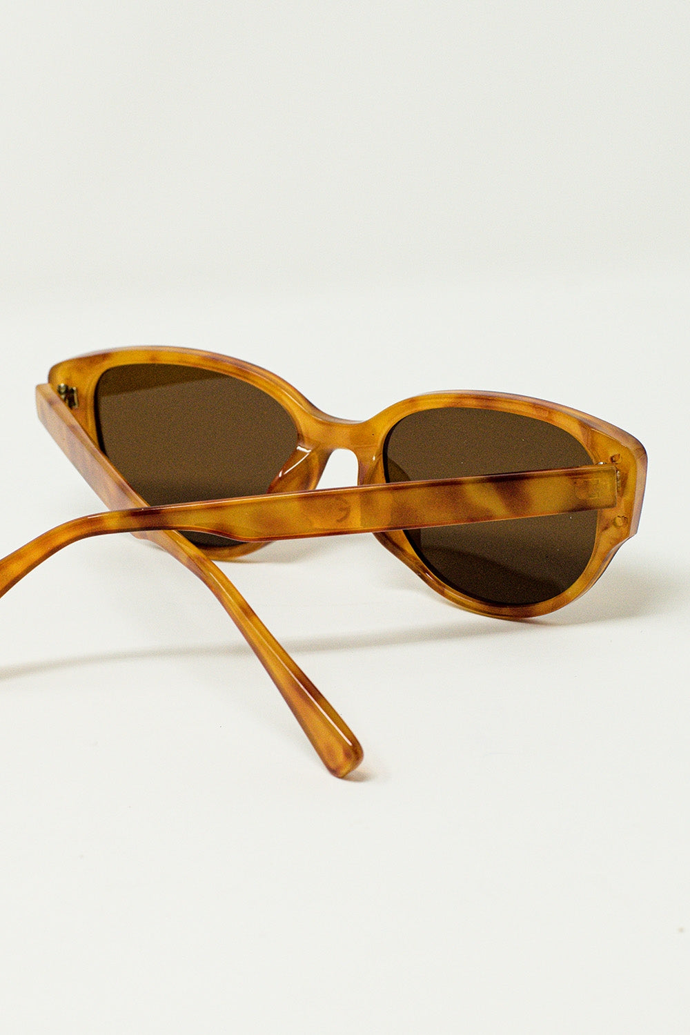Lunettes de soleil ovales en écaille de tortue jaune clair