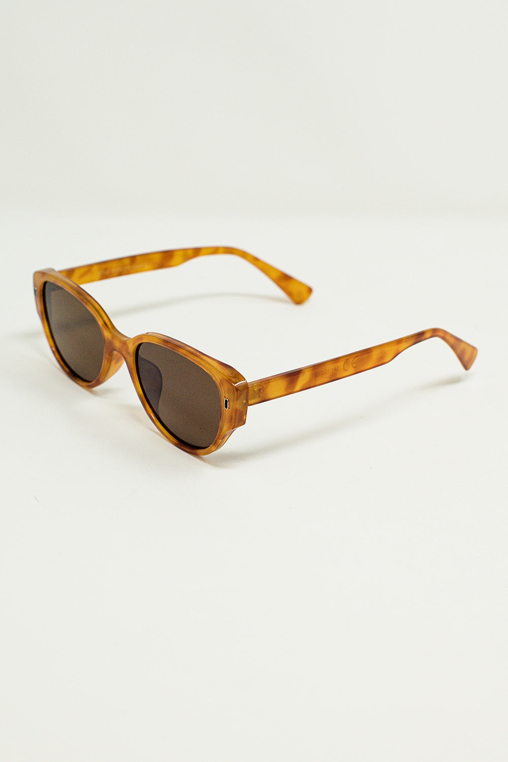 Lunettes de soleil ovales en écaille de tortue jaune clair