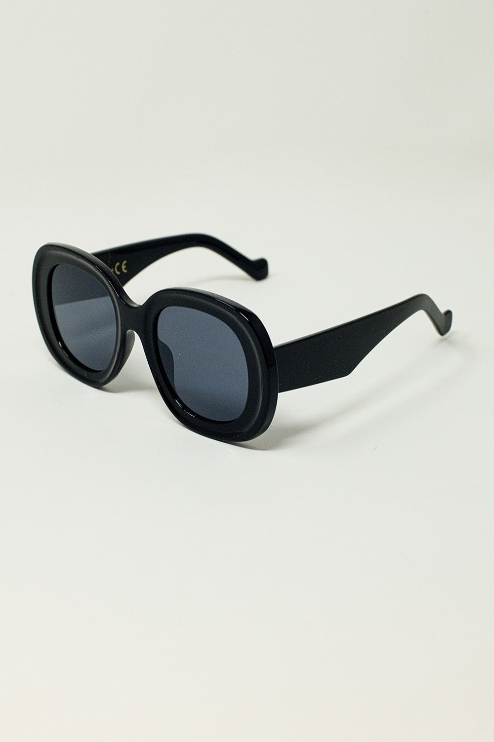 Lunettes de soleil rondes surdimensionnées en noir