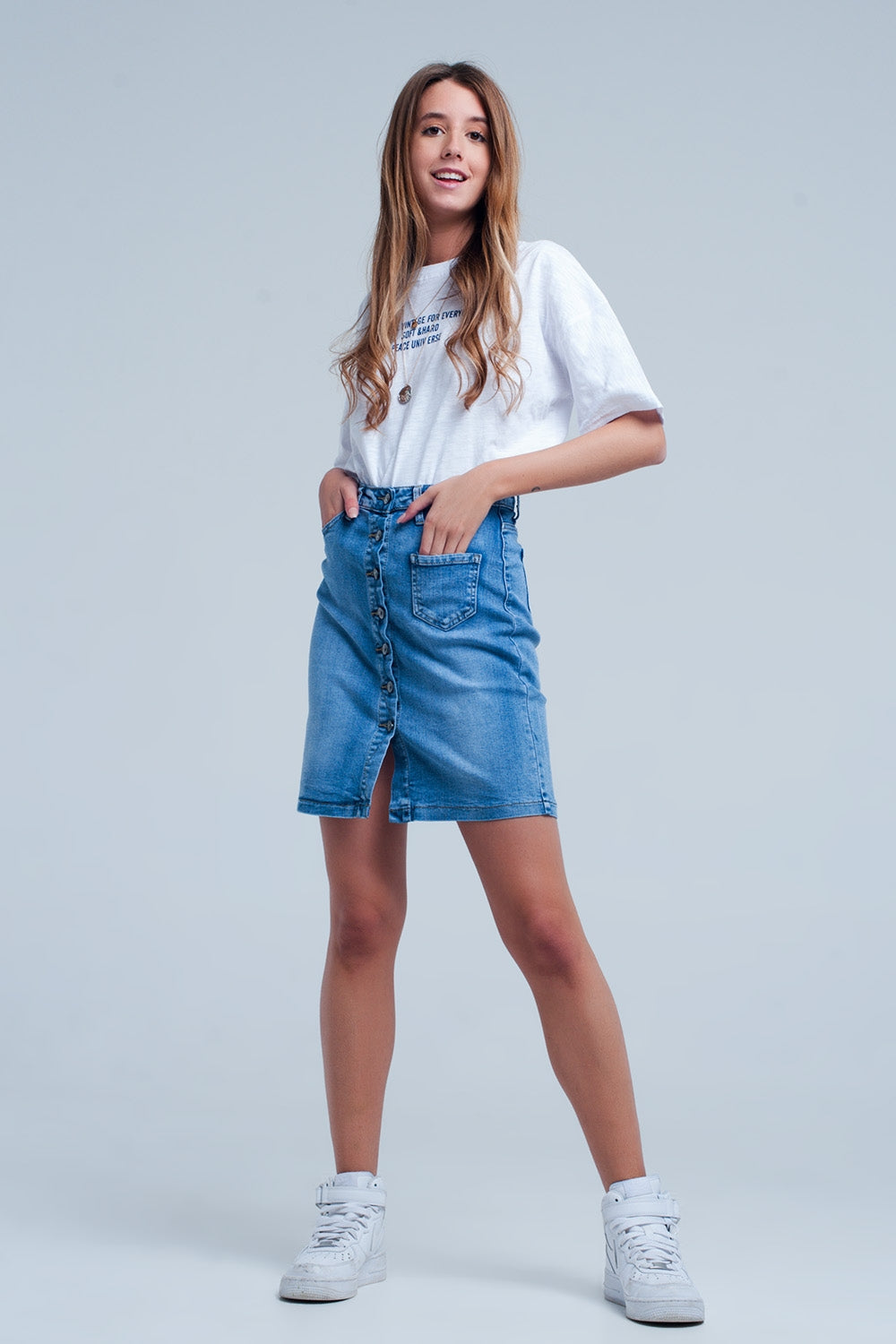 Mini-jupe en jean boutonnée