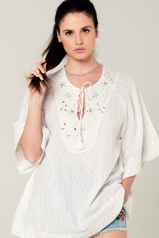 Q2 Mini robe blanche avec détails brodés