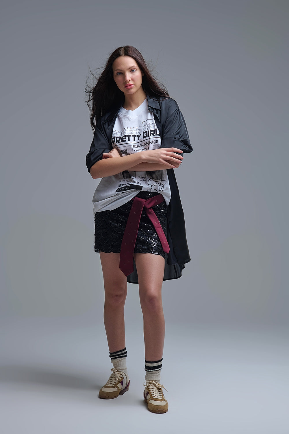 Minijupe à paillettes festonnées noire