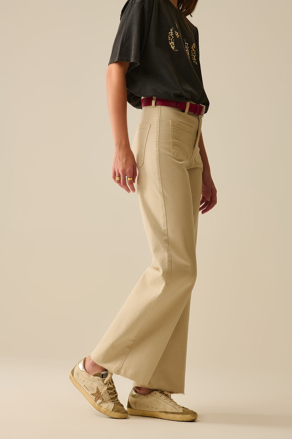 pantalon à jambes larges avec poches avant en beige