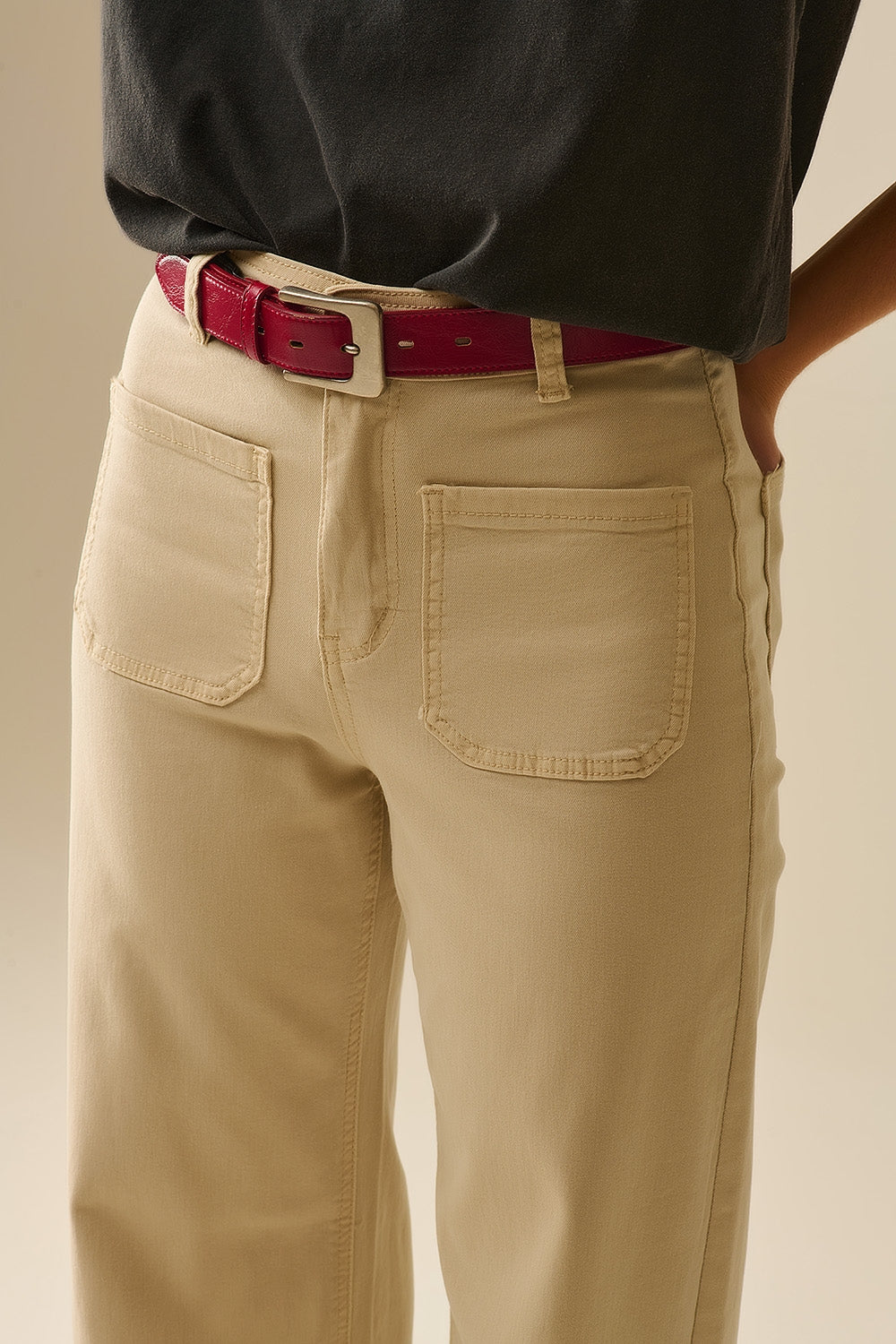 pantalon à jambes larges avec poches avant en beige