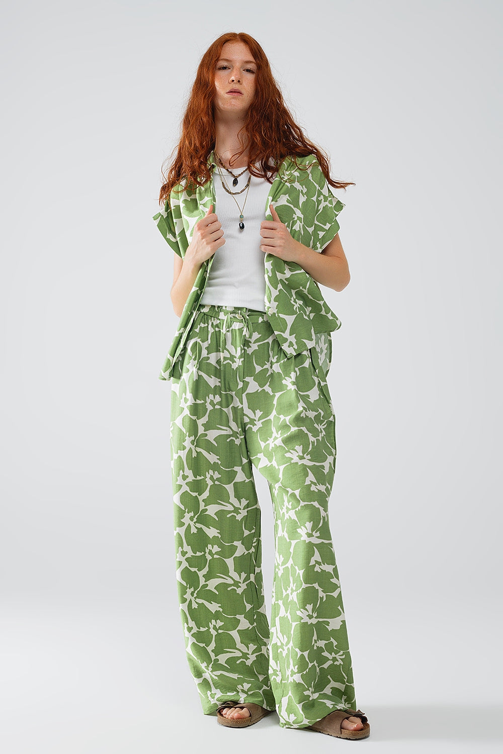 Pantalon à taille élastiquée avec imprimé floral vert