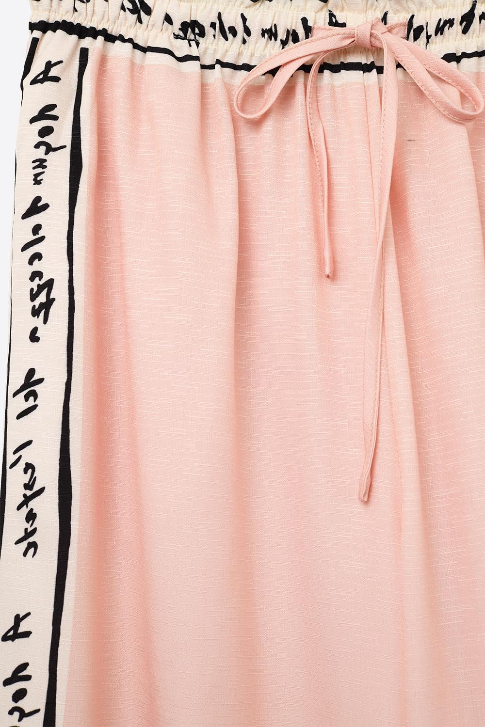 Pantalon d'été rose imprimé aquarelle