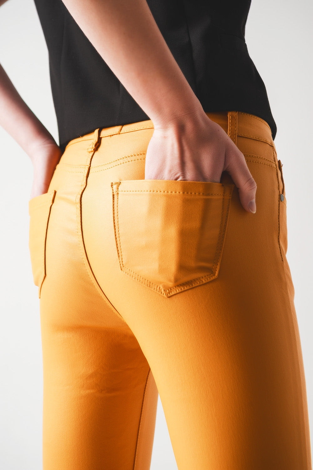 Pantalon enduit orange