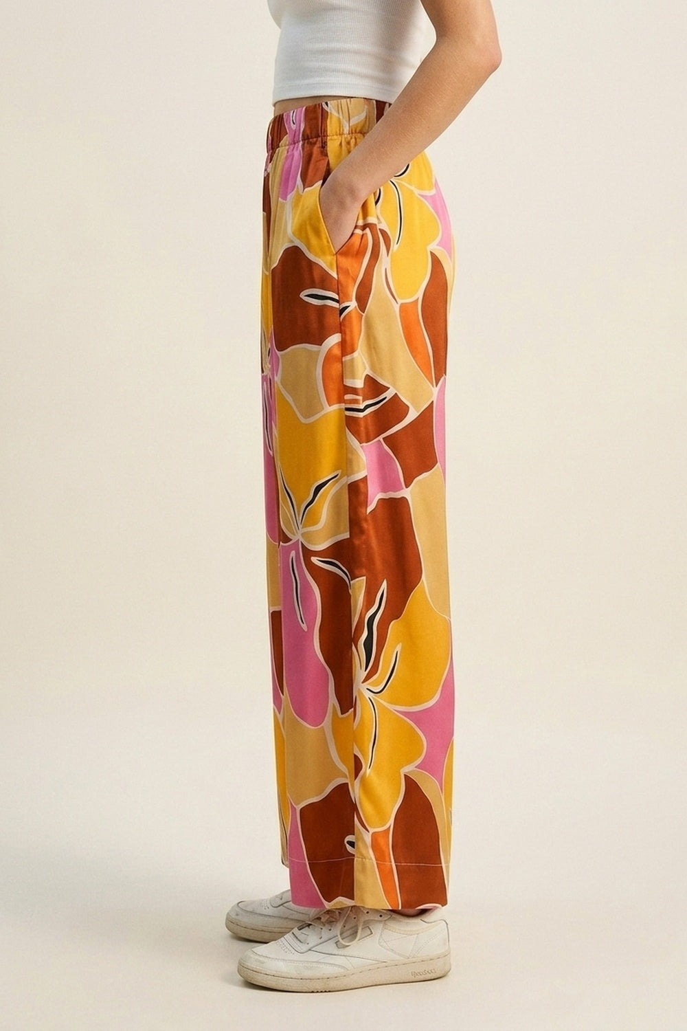 Pantalon large à imprimé tropical dans des tons orange chaud