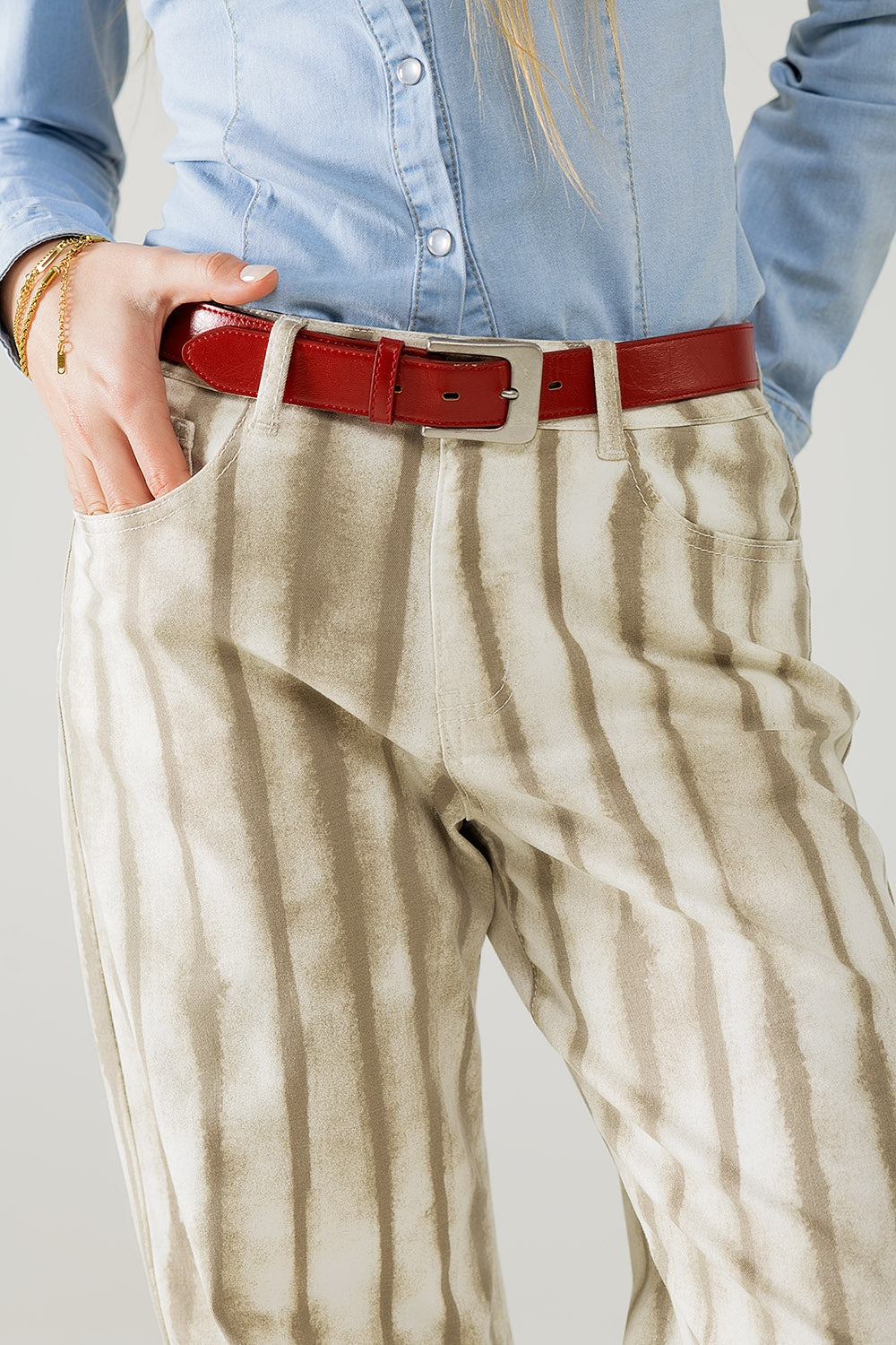 Pantalon large beige à rayures élastiques