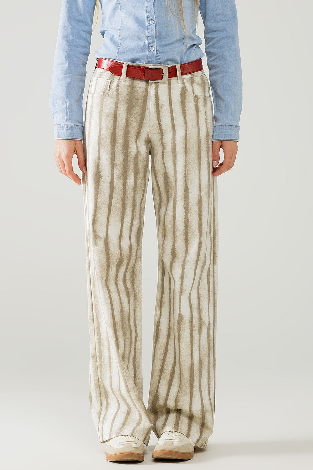 Pantalon large beige à rayures élastiques