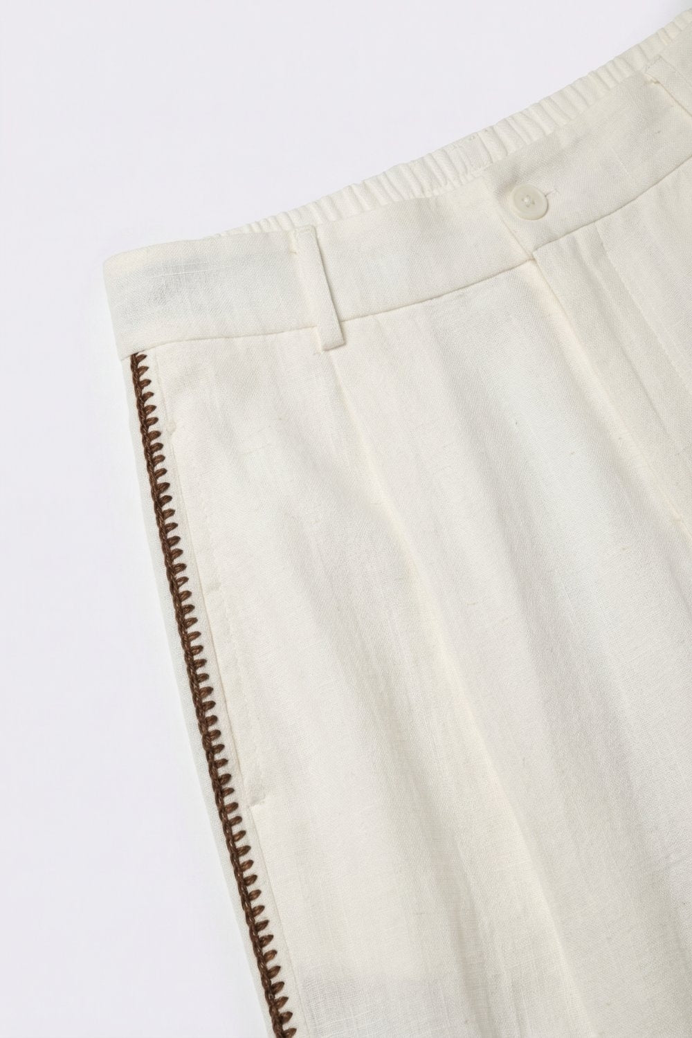 Pantalon large blanc avec détail latéral en zigzag marron