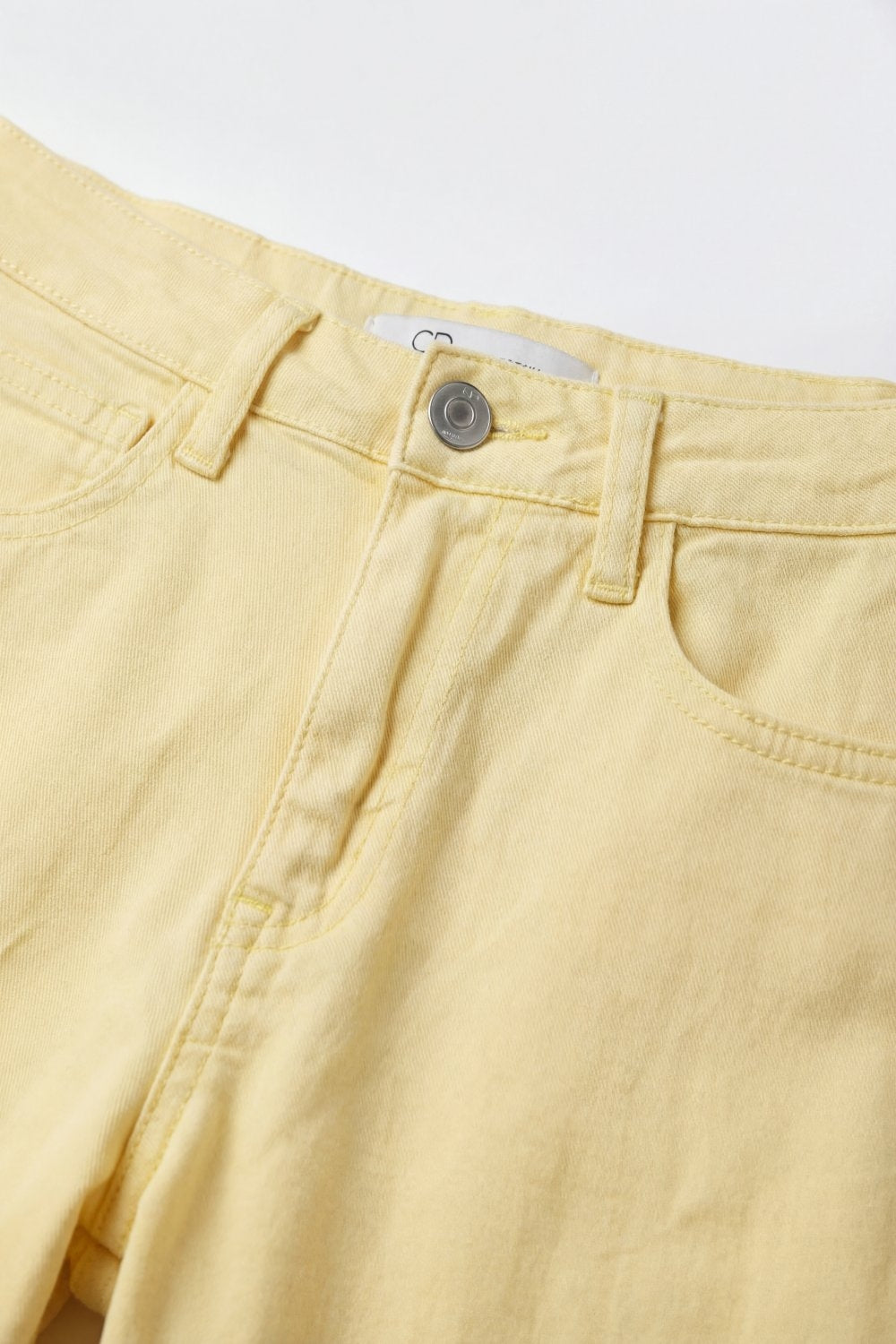 Pantalon large en coton jaune clair avec couture latérale