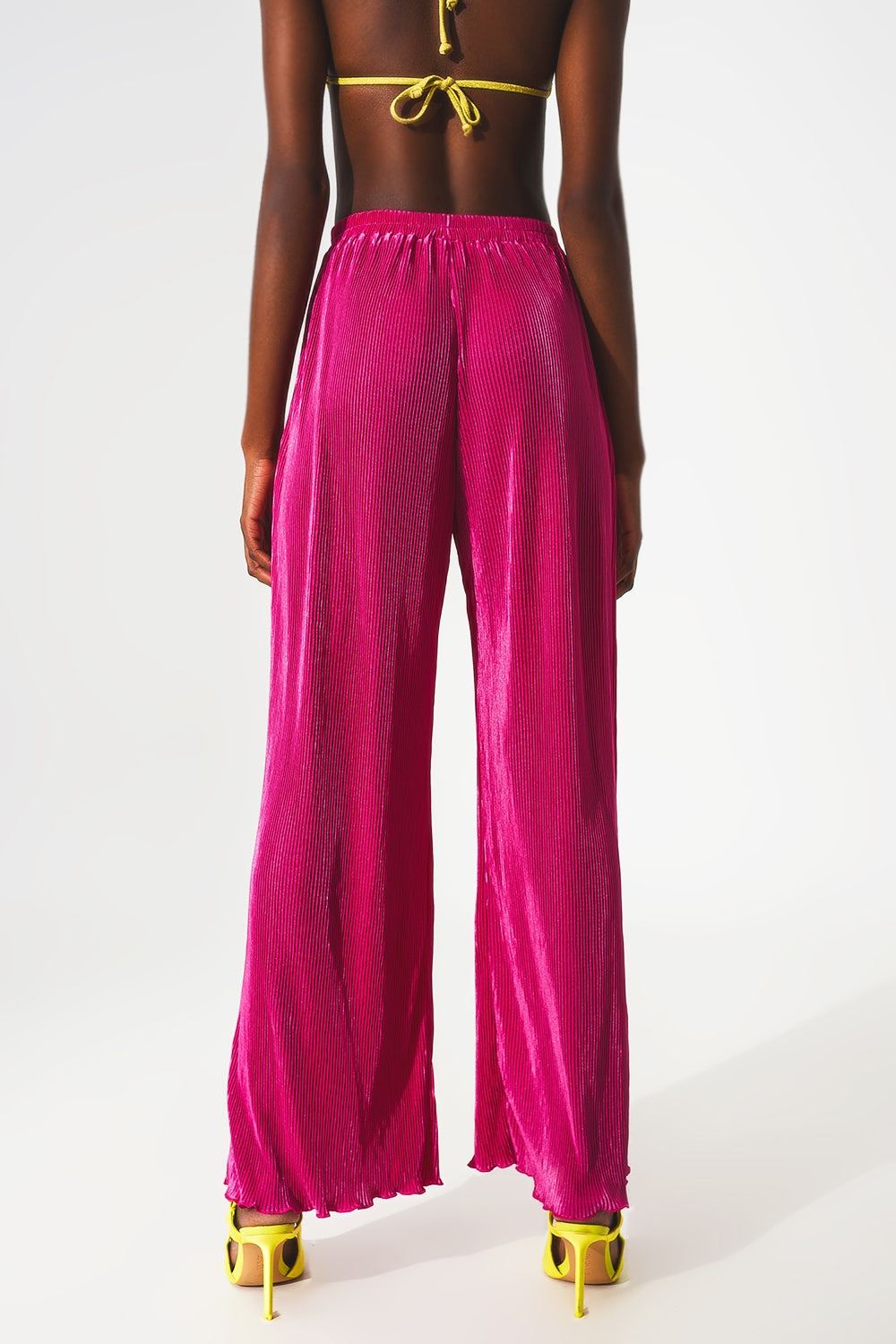 Pantalon large plissé en satin fuchsia