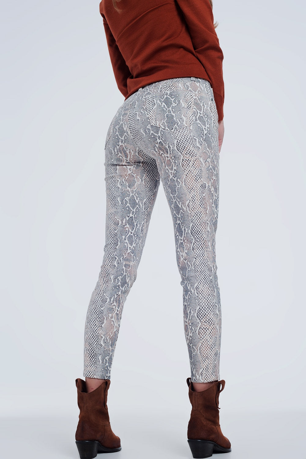 Pantalon texturé à imprimé serpent beige