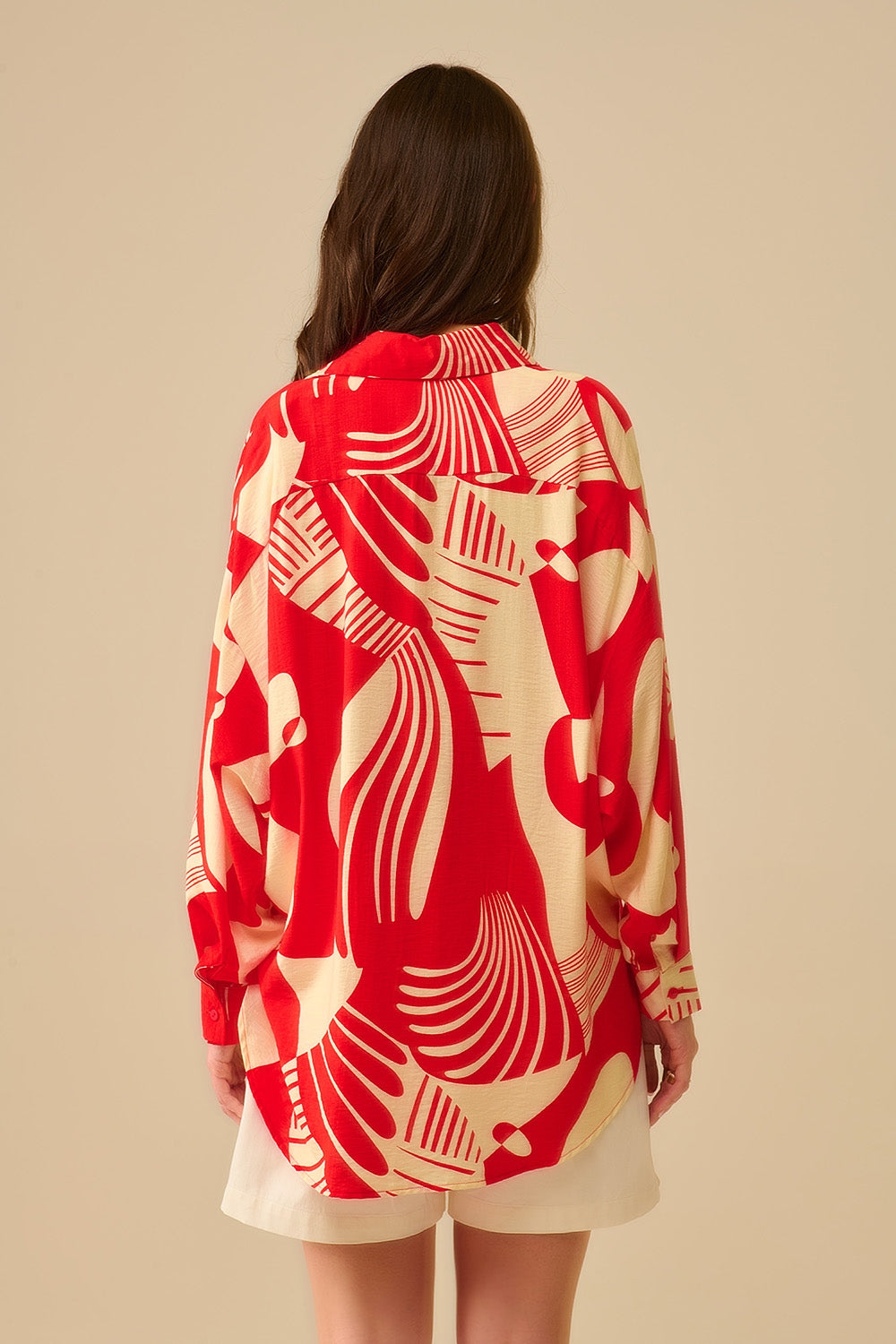 Polo rouge à imprimé abstrait