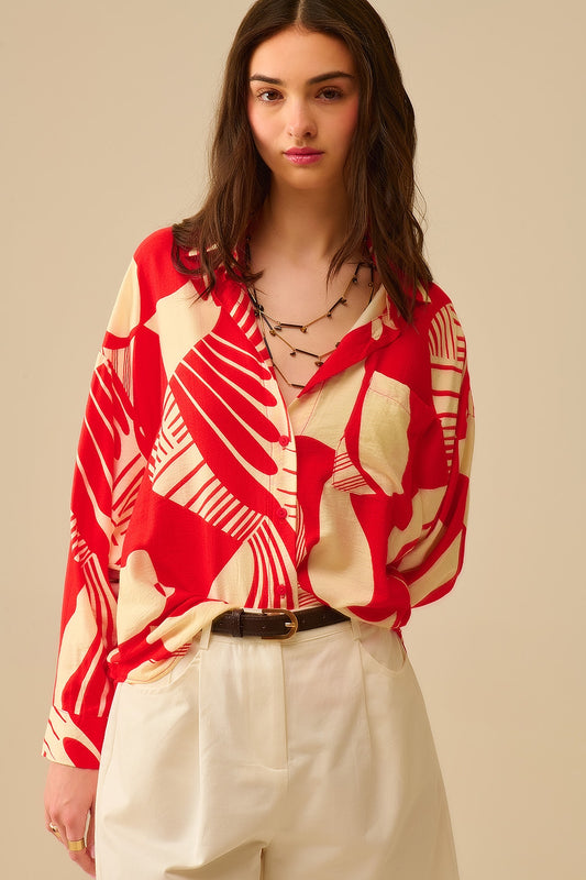 Q2 Polo rouge à imprimé abstrait