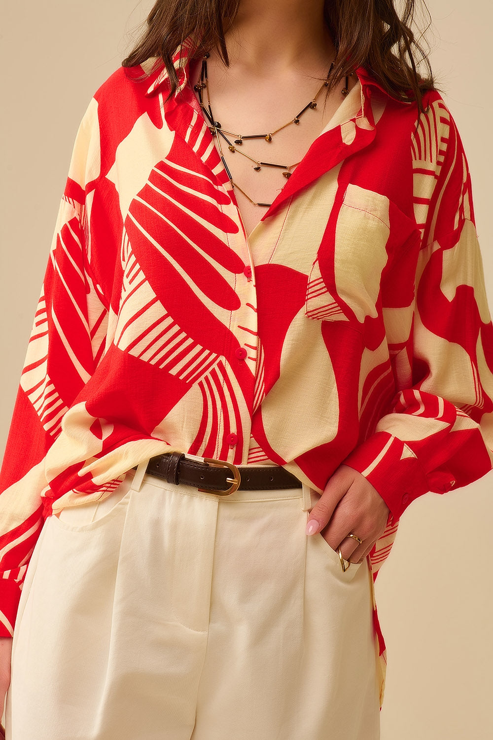 Polo rouge à imprimé abstrait