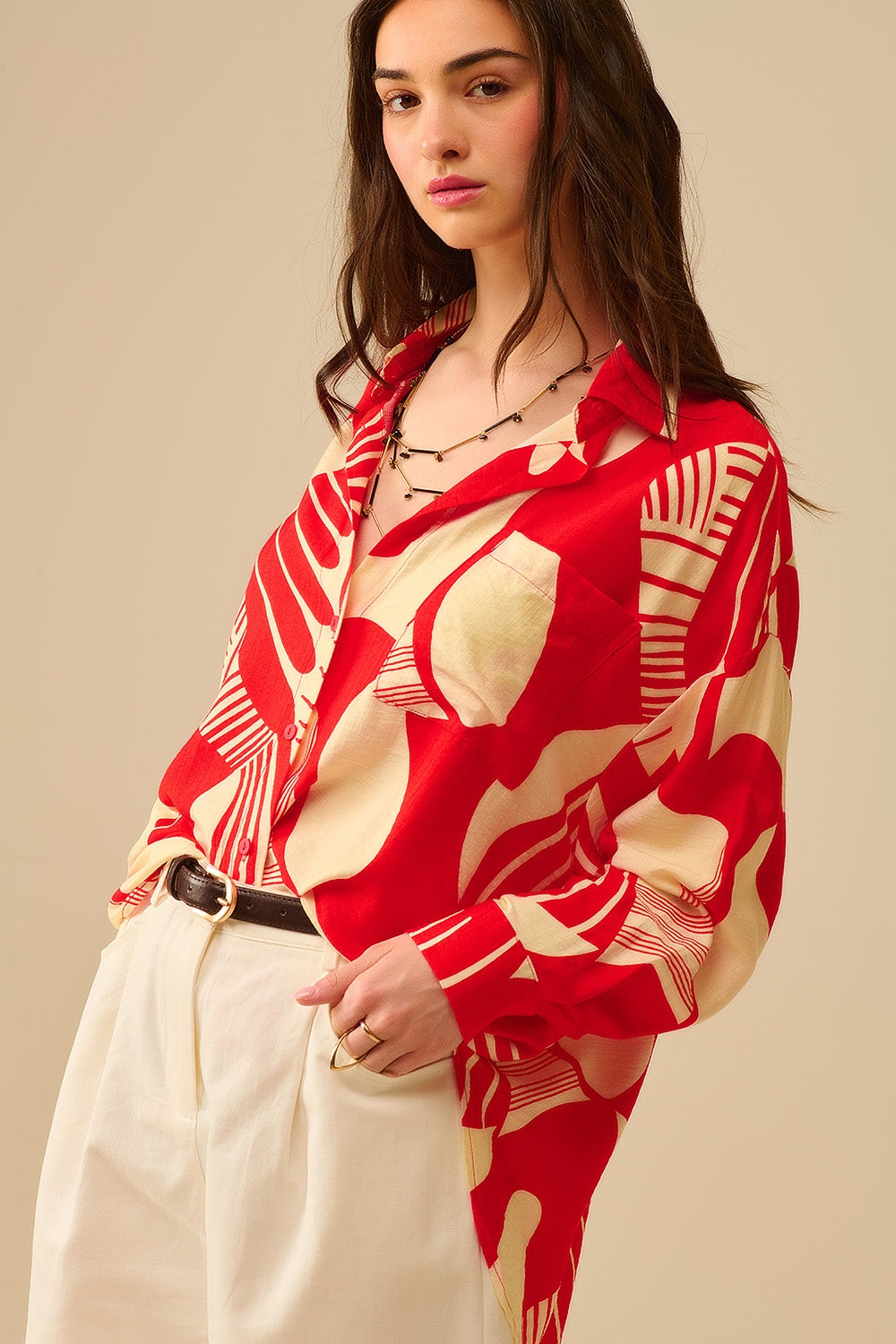 Polo rouge à imprimé abstrait