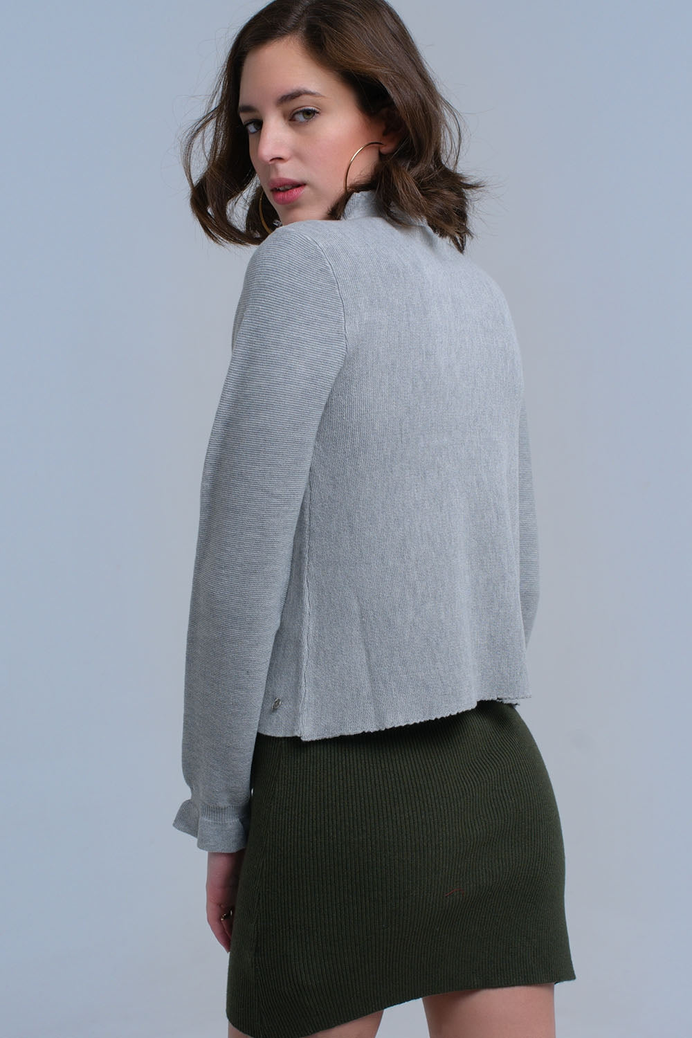 Pull à volants en gris