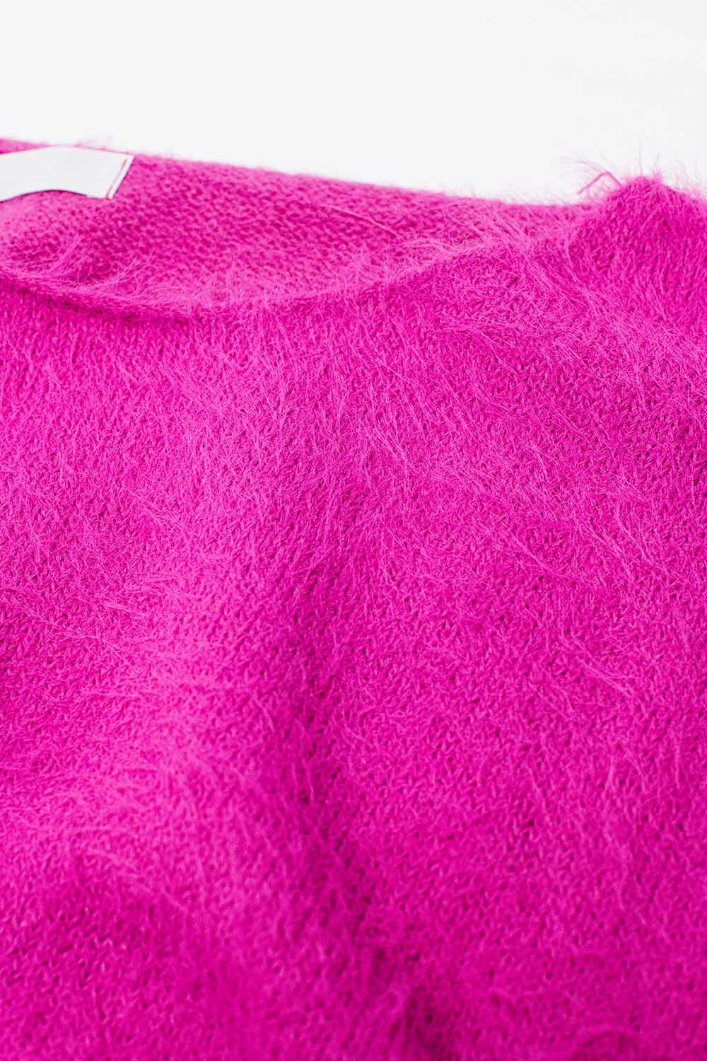 pull cropped fluffy en fuchsia ajusté à la taille