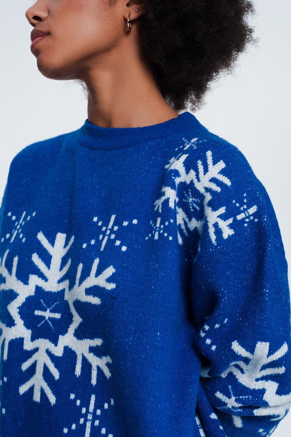 Pull de Noël motif flocon de neige en bleu