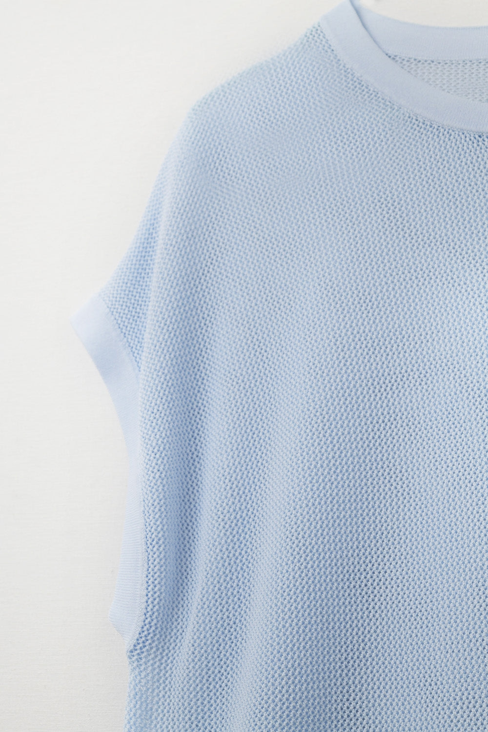 pull en maille à carreaux couleur bleu bébé