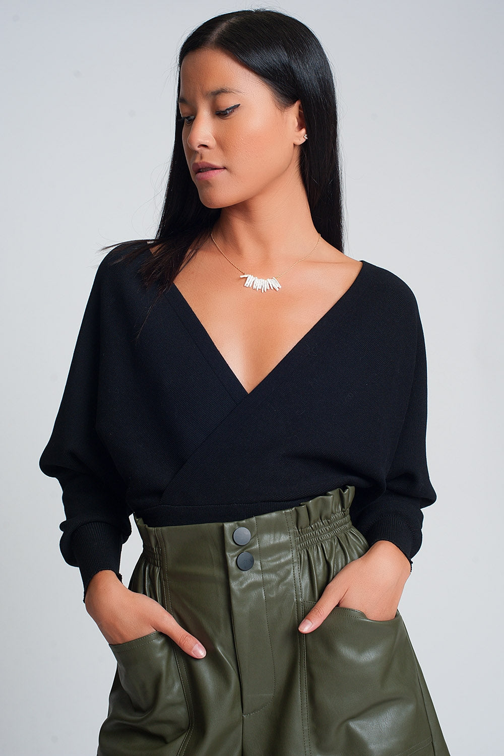 Pull en maille avec col en V enveloppé en noir
