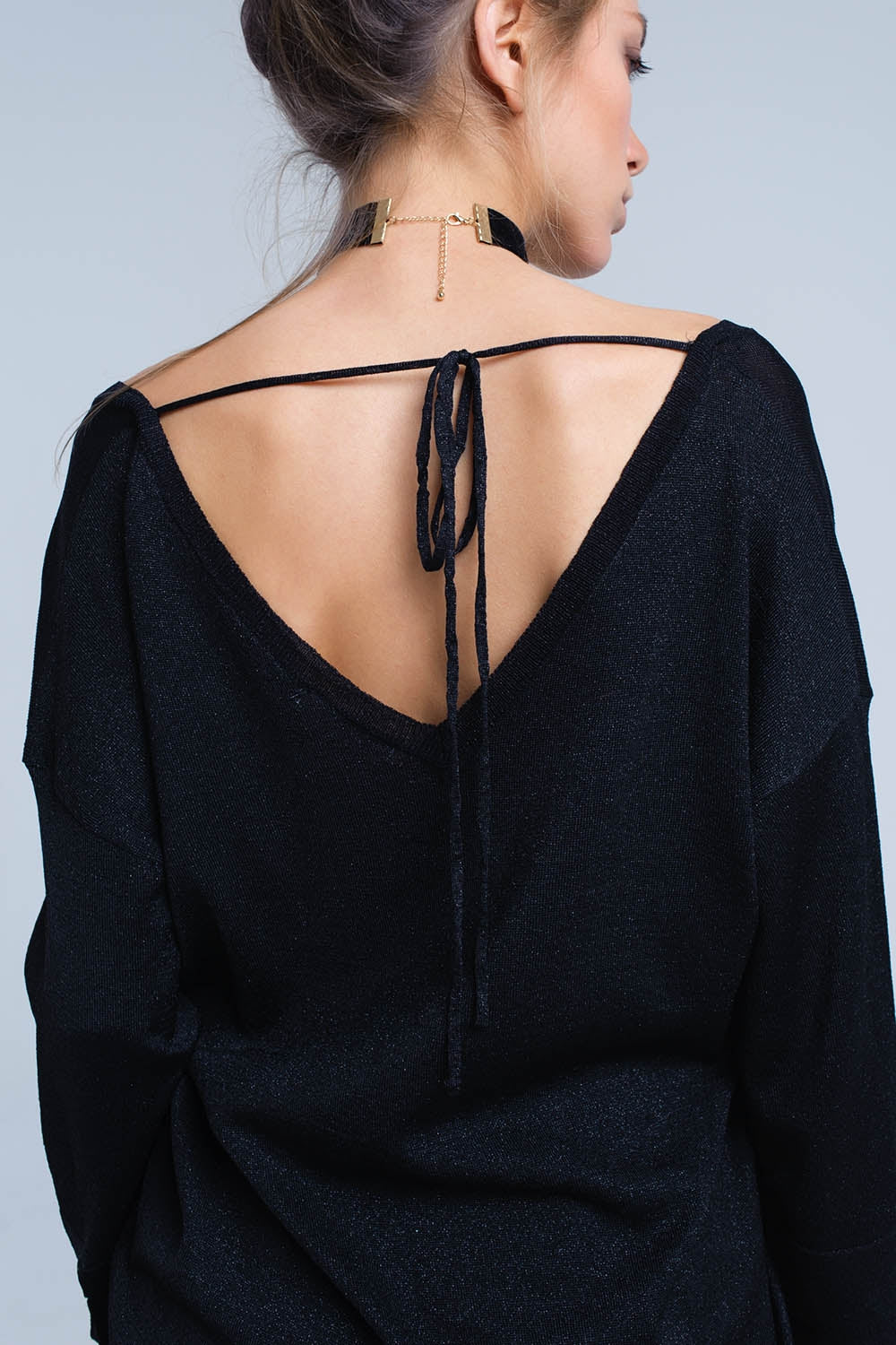 Pull en maille noire avec détail en lurex doré